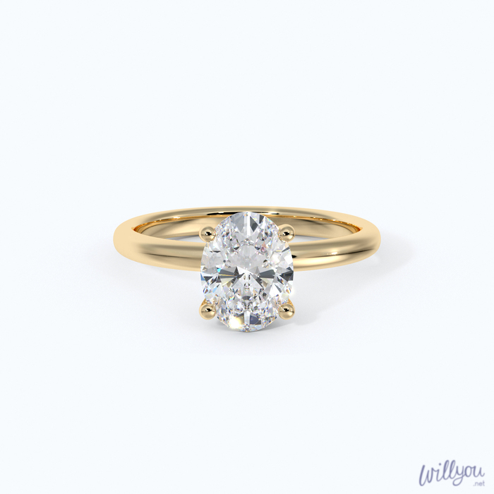 Oval Solitaire Engagement Ring in Yellow Gold