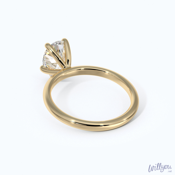Pear Shaped Solitaire Engagement Ring in Yellow Gold