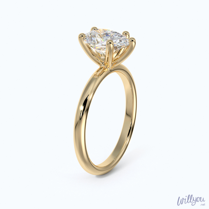 Pear Shaped Solitaire Engagement Ring in Yellow Gold